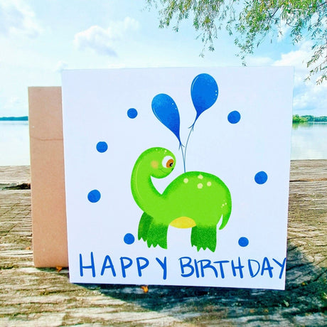 Happy Birthday Brontosaurus Card, Green Dino with Blue Party Globes, Boys Birthday Greeting, Cute Dinosaur Card for Kids, Gift for Children - Leo Hobby Marketplace