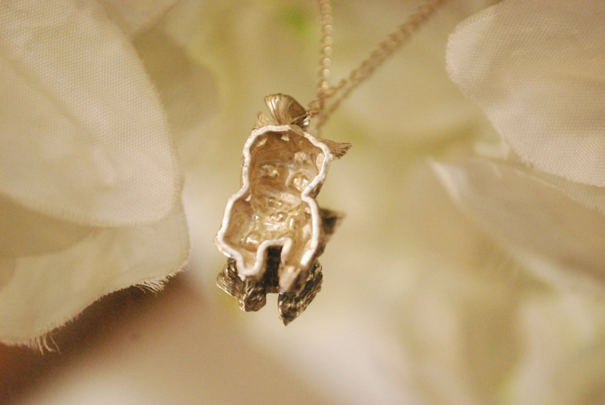 Yorkie pendant on a chain.