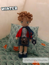 Oliver Crocheted Doll in a playful setting for decoration.